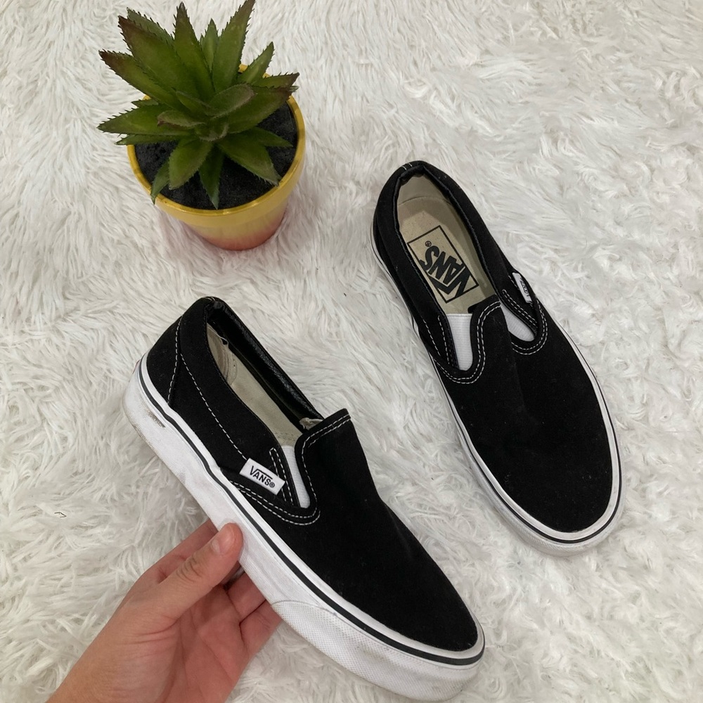 Vans Black and White Slip-On Sneakers